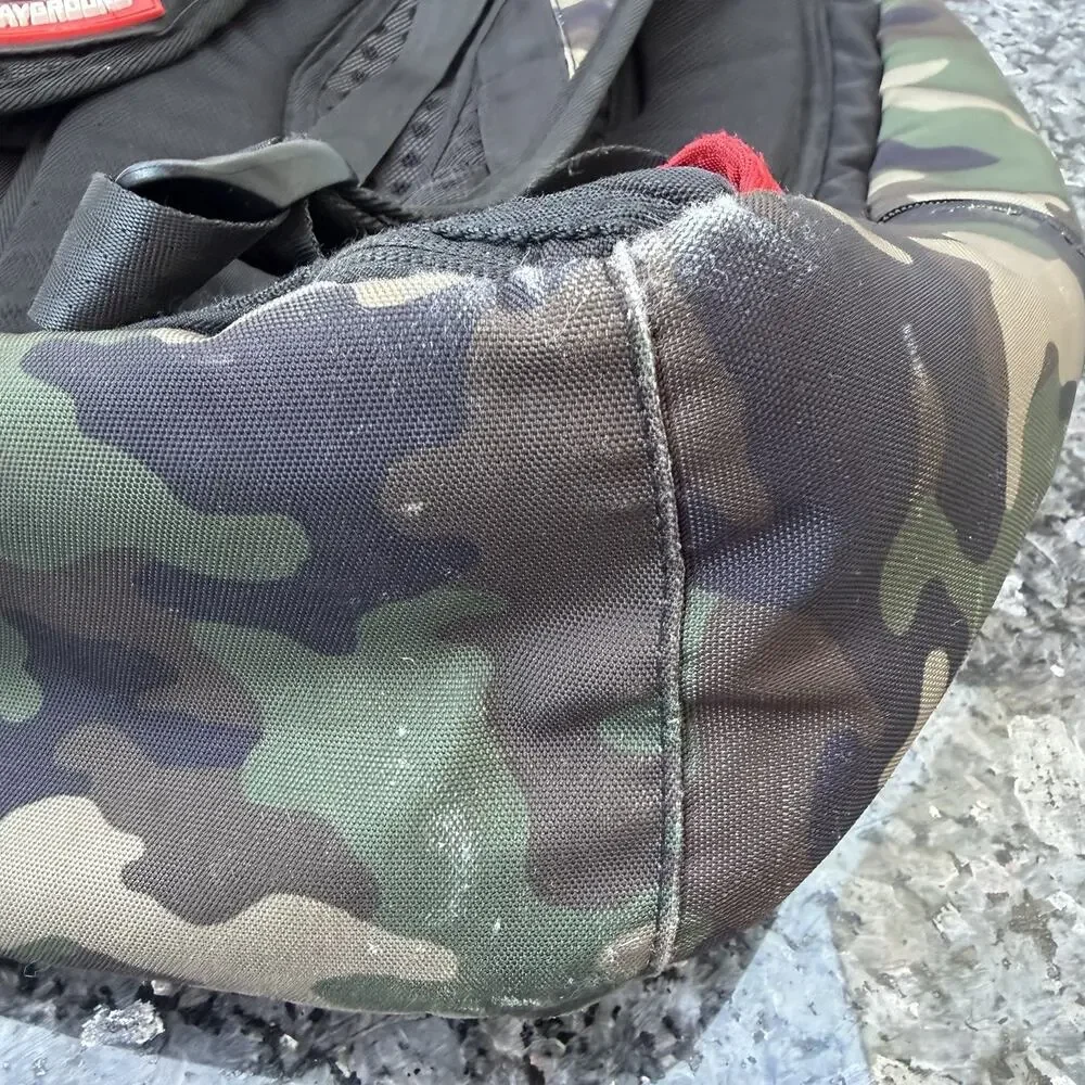Sprayground Camouflage Backpack with Peace Sign Patch
